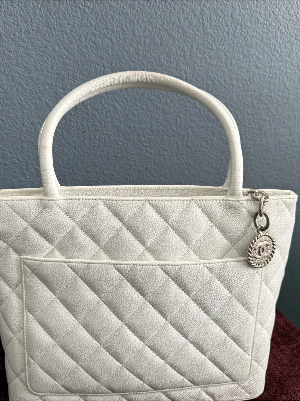 CHANEL Caviar Quilted Leather Tote with Silver Medallion